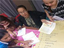 Group 1 got their heads together during the workshop of the Training on VAWC.