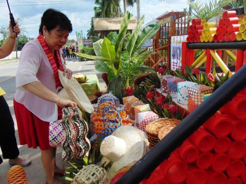 Dr. Luz Taposok visits the exhibit of different cultural, agriculture and tourism products of Davao del Norte during its 50th Founding Anniversary held in the Sports and Tourism Complex.