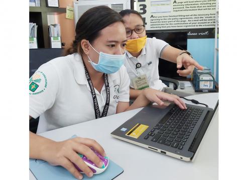 Ma. Pamela N. Respecia and Rhea Kristine Q. Bongcac of ATI-7 behind the FAITH Webinar