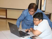 Jose Rey Alo assists ATI webmasters.